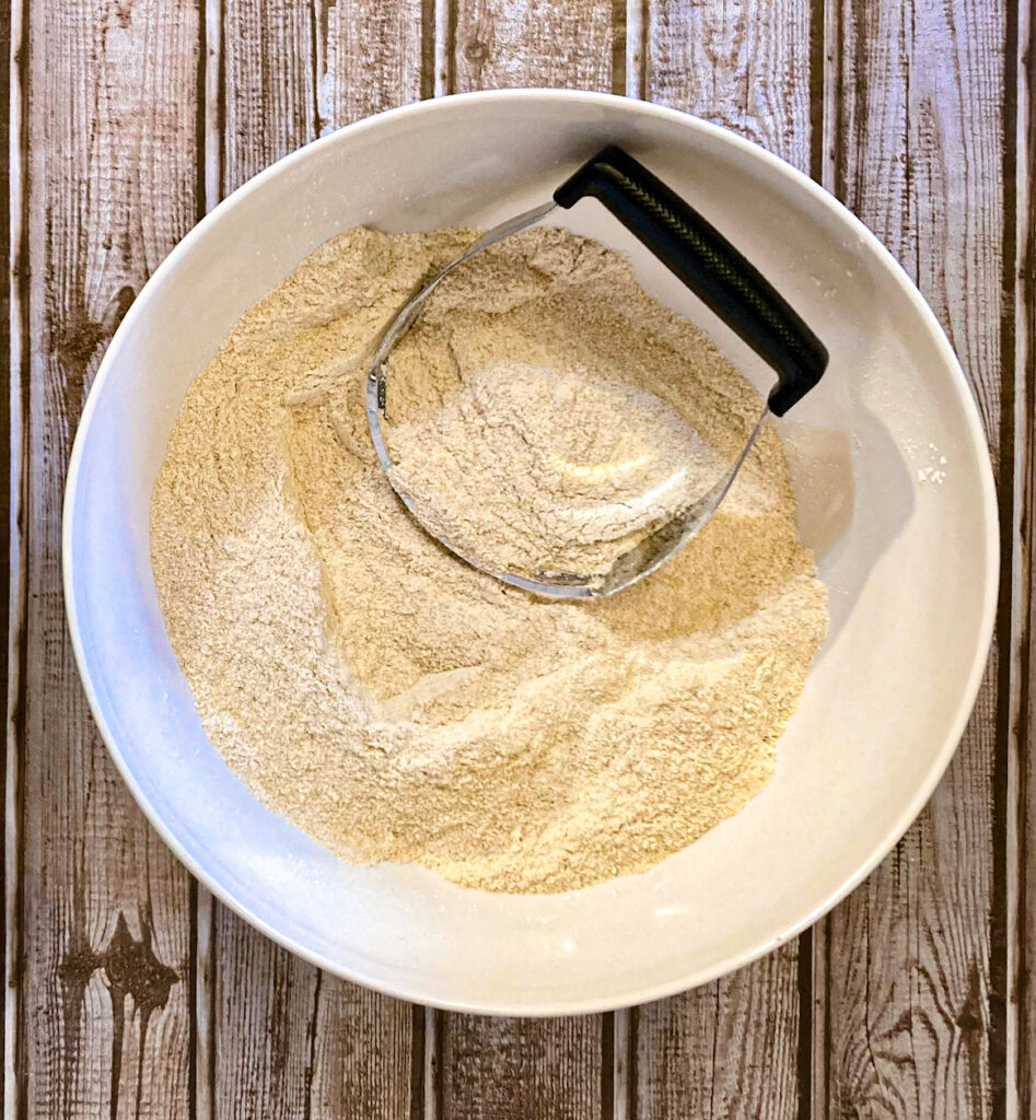 All the dried ingredients to make the biscuit recipe are mixed in a bowl
