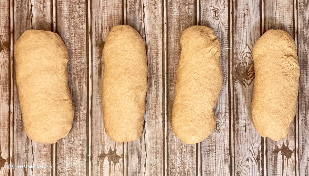 Four molded bread dough loaves