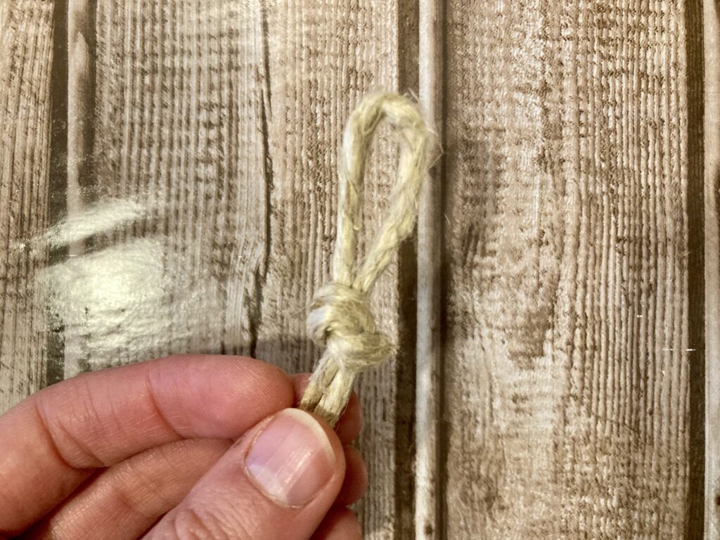 Jute Twine tied in a overhand loop to create banner