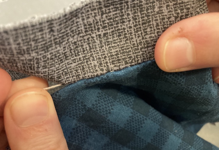Close up a the basic hand stitch of the railroad stitch. How To Sew Basic Hand Stitches