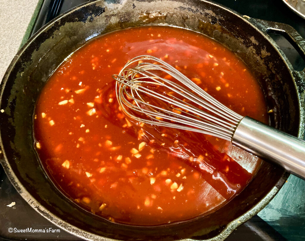Meatloaf sauce cooking in a pan