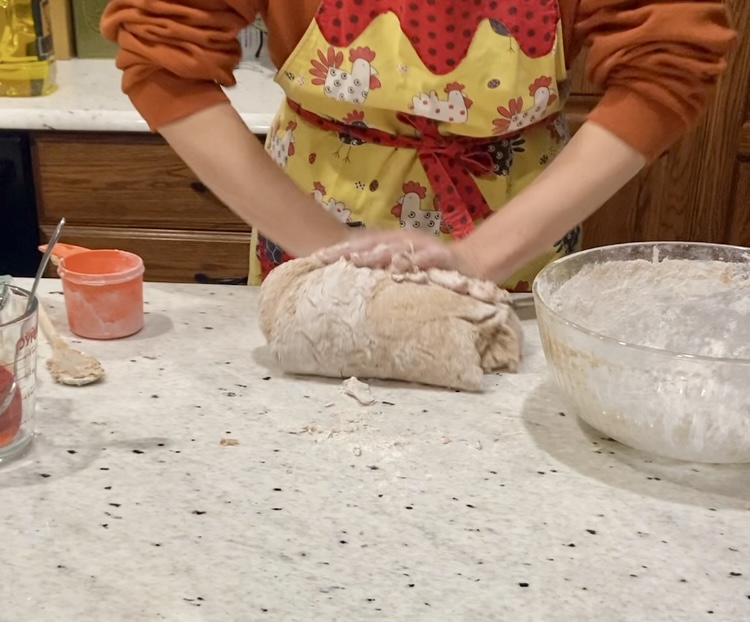 kneading the natural yeast bread