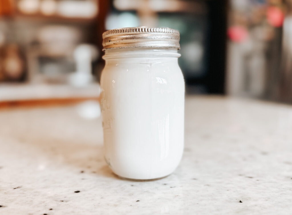 Fresh clabber in a pint jar